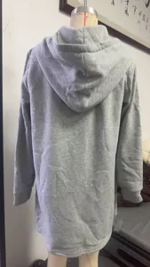 Detailed view of the back of a women's gray fleece hooded long sweatshirt jacket casual.