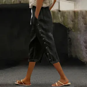 Summer casual cropped pants for women with elastic drawstring waist and side button details.