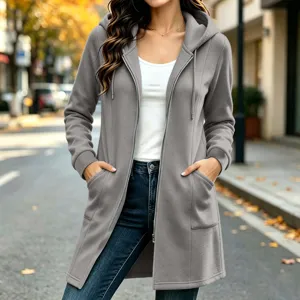 Detail view of women solid grey long zip hoodie with pockets, cozy fleece fabric street style.