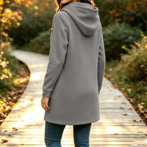 Detailed view of the long fleece hooded sweatshirt in solid grey, worn outdoors today.