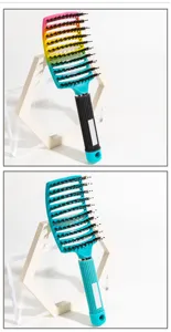 Curved vent hairbrush with natural boar bristles for smooth hair styling and daily scalp massage.