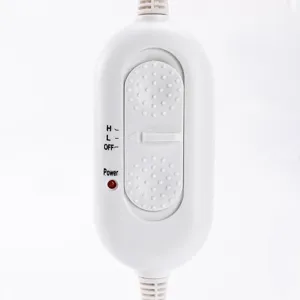 White electric heating cap temperature controller with switch settings and power indicator.