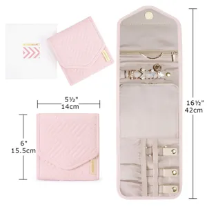 Detailed view of travel jewelry organizer showing folding design and interior layout.