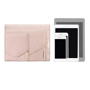 Travel jewelry organizer bag, pink quilted foldable storage case for necklaces earrings.