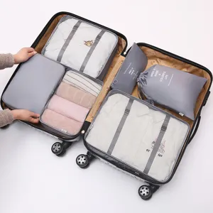 Kit de 6 cubes de rangement de voyage pour valise, sacs organisateurs gris pour vêtements.