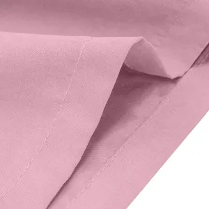 Detailed close-up of pink casual trousers fabric, featuring soft texture and neat stitching.