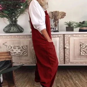 Women solid color casual overall jumpsuit side detail view, comfortable loose fit apparel.