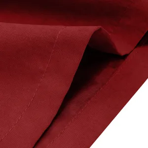 Detailed close-up view showing the fine texture and neat stitching of the solid red fabric.