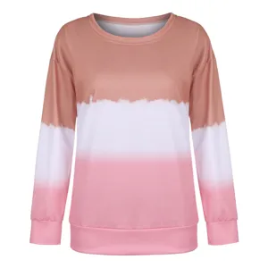 Close-up view of the gradient tie-dye long sleeve fabric texture and cuff details.