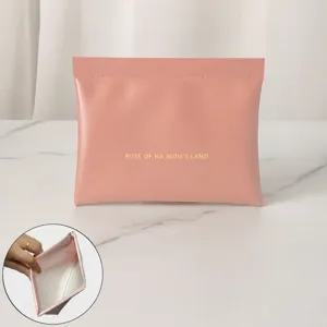 Pochette de maquillage rose mini portable pour rouge à lèvres et écouteurs fermeture auto.