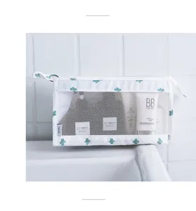 Detail view of portable mesh travel cosmetic bag with cactus pattern for toiletry storage.