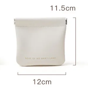 Mini poche de rangement en cuir blanc, sac de fermeture automatique portable pour écouteurs.