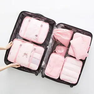 Set de 8 cubos de viaje rosas bolsas organizadoras de equipaje impermeables para almacenar ropa.