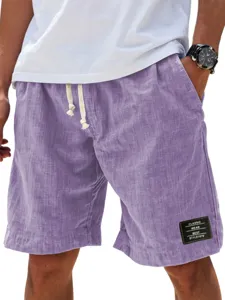 Pantalones cortos de lino casuales de verano holgados de playa con cordón y parche
