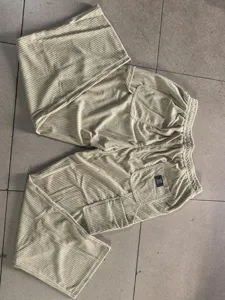 Men's corduroy casual straight pants with drawstring and pockets, retro style detail view.