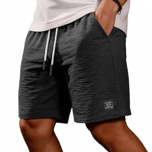 Shorts da uomo casual testurizzati grigio scuro con coulisse e patch per l'estate.