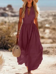 Robe longue femme été col V sans manches unie dos nu élégante robe de plage décontractée.