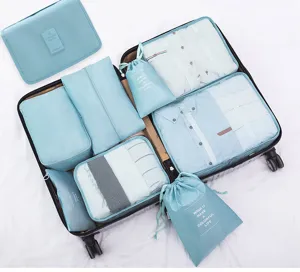 9-piece travel packing cubes set, portable luggage organizers for clothes and toiletries detail.