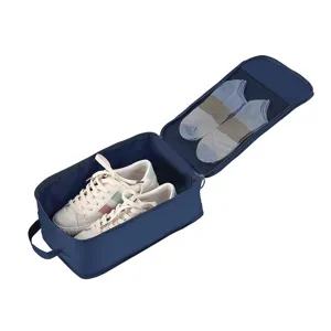 Portable travel shoe storage bag with mesh pocket for shoes and socks, blue folding design.
