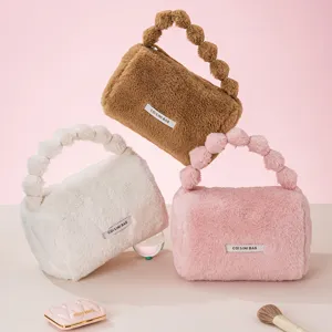 Cute fluffy handbag for women, winter plush crossbody bag with beaded handle, fuzzy purse.