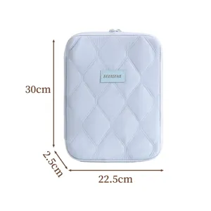 Light blue quilted laptop sleeve and tablet protective case for 11 inch devices with zip.
