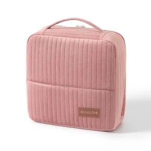 Pink quilted makeup bag large capacity travel cosmetic organizer with handle and logo patch