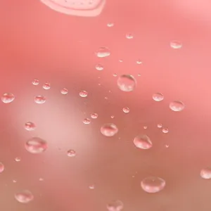 Waterproof candy color PVC toiletry bag surface close-up showing excellent water resistance.