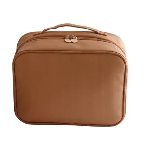 Multifunctional brown PU cosmetic bag with top handle and convenient storage for travel.