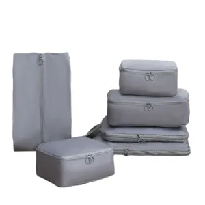 Set de cubos de viaje grises, organizadores de equipaje portátiles para ropa, zapatos y maletas.