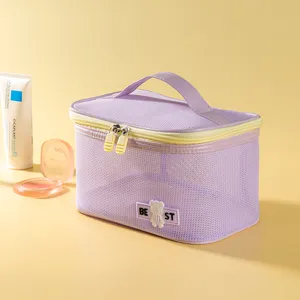 Large capacity mesh cosmetic bag portable purple travel toiletry organizer with handle.
