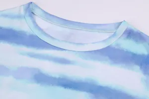 Close-up detail of blue white gradient tie dye crewneck collar and soft fabric texture.