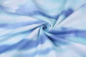 Close up of soft blue and white tie dye gradient fabric material texture detail design