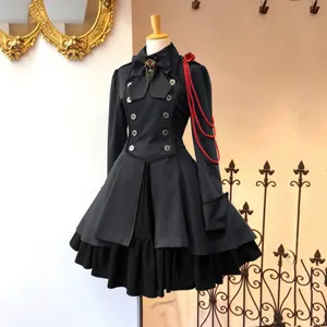 Gotisches Vintage Langarm-schwarzes Kleid Detail mit zweireihigen Knöpfen und edler Schleife.