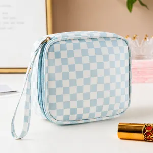 Blue checkerboard PU cosmetic bag, portable mini makeup pouch with wrist strap.