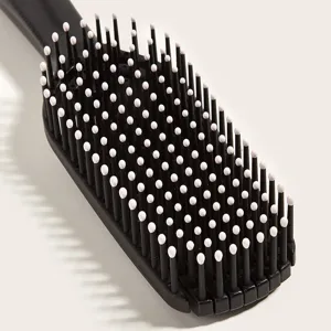 Black vent hair brush with white tipped bristles for smooth detangling scalp massage main view