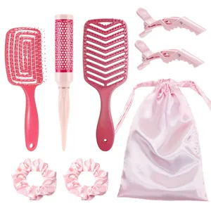 Pink hair brush set with styling combs, hair clips, scrunchies, and storage pouch for women.
