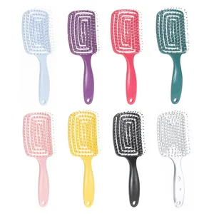 Curved vent hair brush for fast blow drying, detangling and scalp massage styling tool.