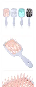 Brosse à cheveux de massage creuse avec design en nid d'abeille flexible pour démêler les cheveux.