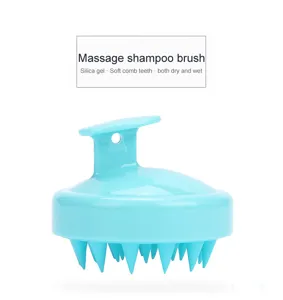 Brosse de massage pour le cuir chevelu en silicone avec poils souples pour cheveux secs ou humides.