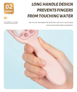 Close-up detail of pink silicone scalp shampoo brush featuring ergonomic long handle design.
