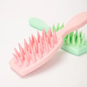 Soft silicone hair brush scalp shampoo brush main view pink and green set clean background
