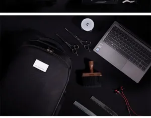 Professional hairdresser backpack detail with spacious tool compartments for scissors and combs.