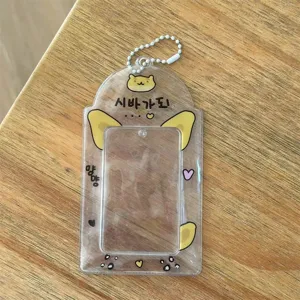 Close-up transparent cute animal ear photocard holder detail view with lovely design chain