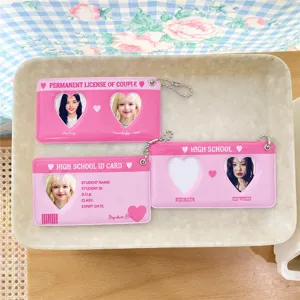 Pink heart photocard holder keychain set detail view, cute idol photo protector case.