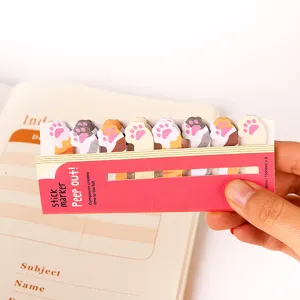 Cute cat paw sticky notes detail view, creative cartoon index tabs and markers for use.