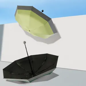 Compacte 5-voudig opvouwbare zakparasol met zwarte UV-beschermende coating en tweekleurig.