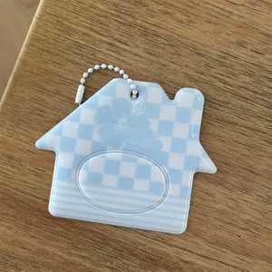 Blue checkered house card holder details, close up of acrylic photo protective case