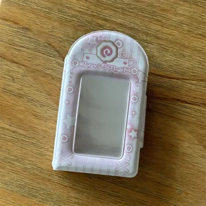 Detailed view of the pink cute 3-inch photocard holder and storage album with lovely fish cake design.