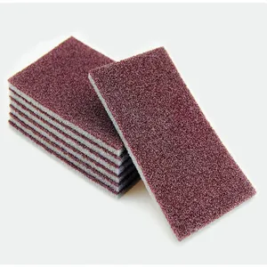 Thin emery sponge abrasive block for kitchen cleaning, rust removal, and pot scrubbing.