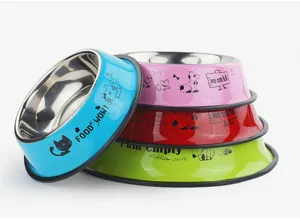 Detailed view of colorful stainless steel pet bowls with cute prints and non-slip rubber bases.